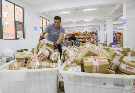 China's courier sector sees business volume jump over 50 pc